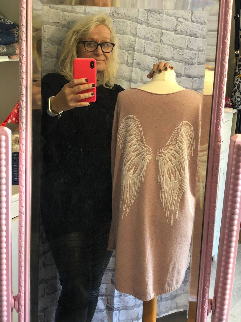 Longer Length Knit With Angel Wing Design